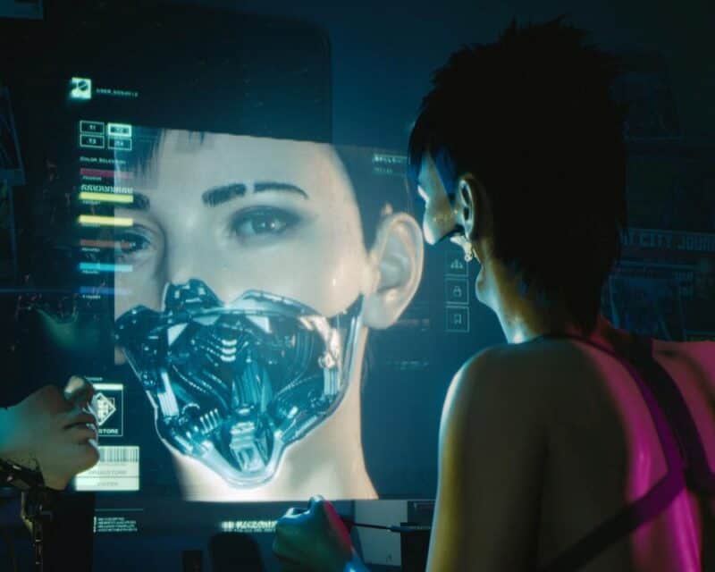 Cyberpunk 2077 kobieta przed ekranem