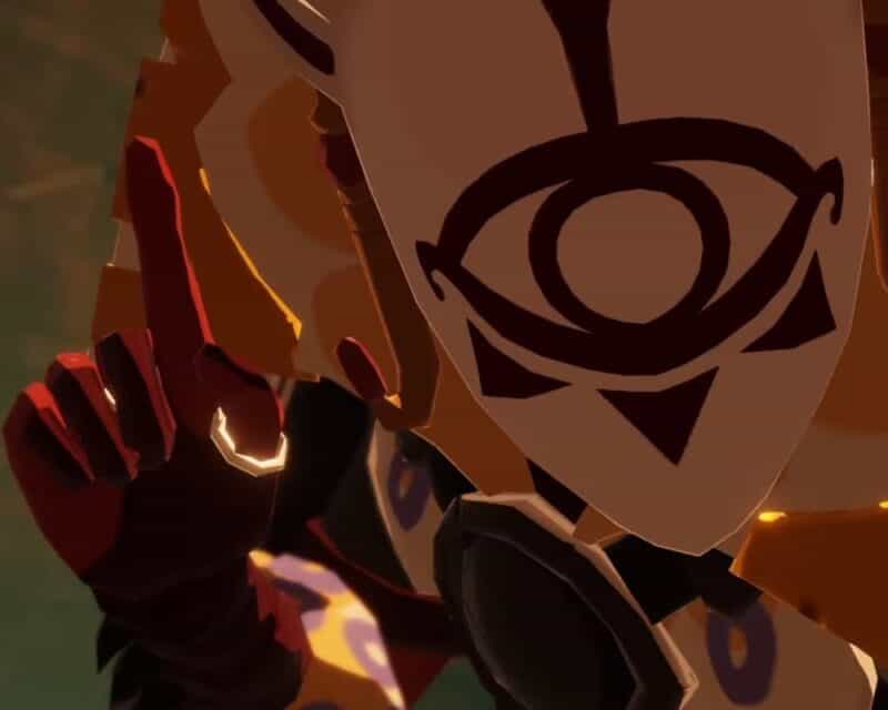 Widoczny wojownik Jiga clan z uniesionym do góry palcem wskazującym