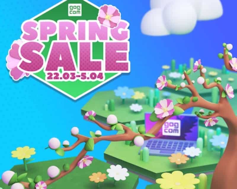 grafika promująca wiosenną wyprzedaż GOG - na zielonych heksach kwitną kwiaty, wśród nich leży laptop z otwartą przeglądarką na stronie GOG.com