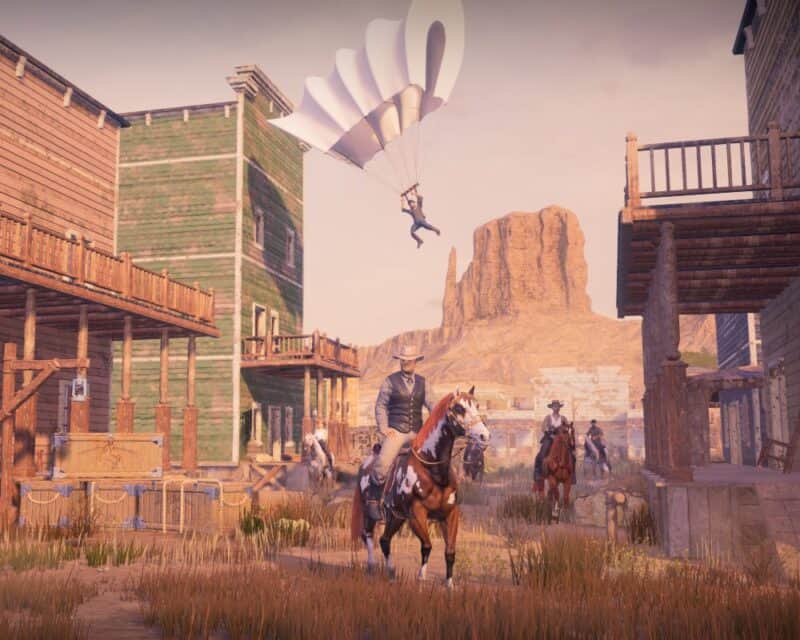 Grit zwiastun Dziki Zachód mężczyźni na koniach spadochron budynki góry