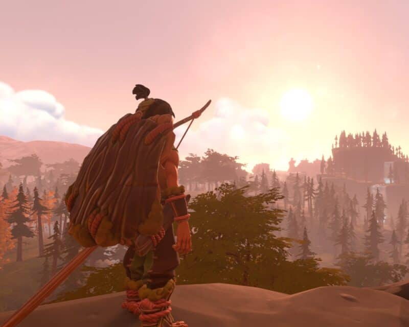 Pine za darmo w Epic Games Store, na grafice jest chłopiec odwrócony plecami do widza, stoi na skraju skały, przed nim rozpościera się widok na góry i zachód lub wschód słońca