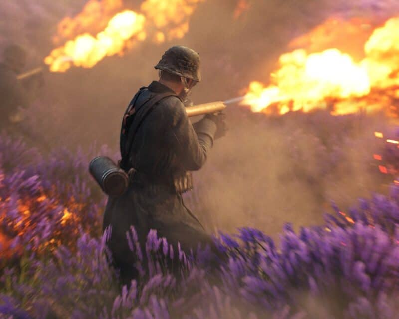 prezentacja Battlefield 6 - screen z wczesniejszej, piątej części gry, żołnierz na łące, ogień