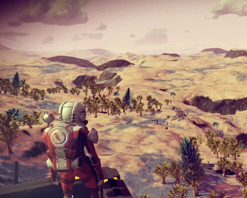 No Man's Sky nowa aktualizacja Prisms - Kosmiczny podróżnik podziwia planetę, przed nim rozciąga się widok na sawannę