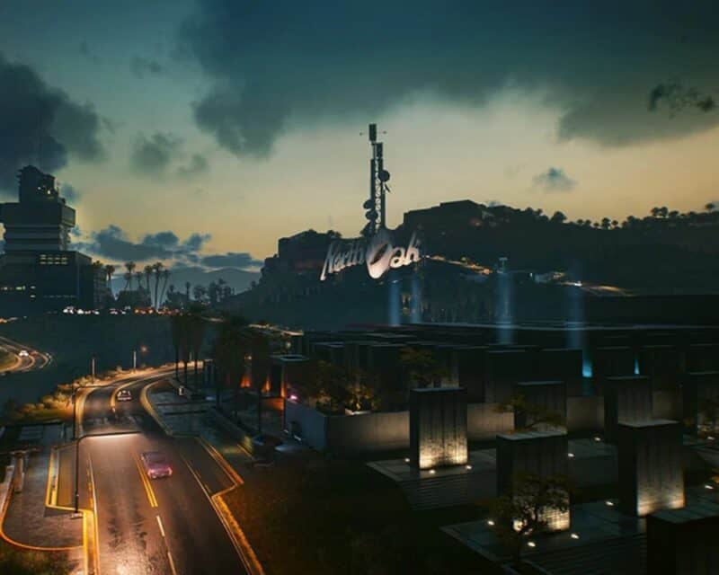 Cyberpunk 2077 ciekawostka North Oak - screen z gry, nazwa dzielnicy, wzgórza, ulica