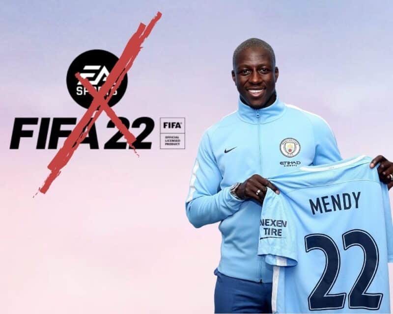 Benjamin Mendy w niebieskiej bluzie sportowej oraz z koszulką niebieską ze swoim nazwiskiem na odwrocie i numerem 22, w tle różowo-niebieskie niebo z materiałów promocyjnych gry fifa 22, piłkarz oskarżony o gwałt i usunięty z gry, po lewej logo gry przekreślone czerwonym krzyżykiem