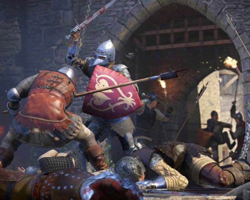 Screen z gry Kingdom Come: Deliverance, dwaj walczący żołnierze i ciała pokonanych, Kingdom Come Deliverance dobra sprzedaż