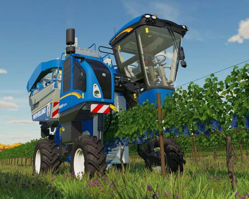 Farming Simulator 22 trafił już do sprzedaży, jest też zwiastun premierowy – screen z gry, niebieska maszyna rolnicza w polu