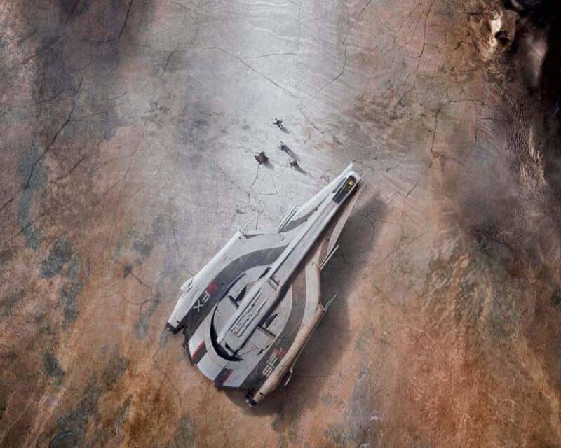 Plakat Mass Effect 4 - fragment grafiki przedstawia statek kosmiczny oraz cztery oddalające się od niego postacie