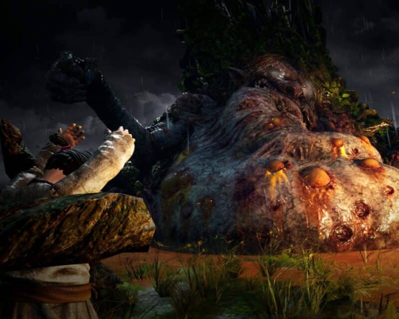 screen z gry Gord, potwór z lasu chwytający macką mężczyznę, mężczyzna ten unosi ręce do góry w beznadziei, Gord nowy zwiastun