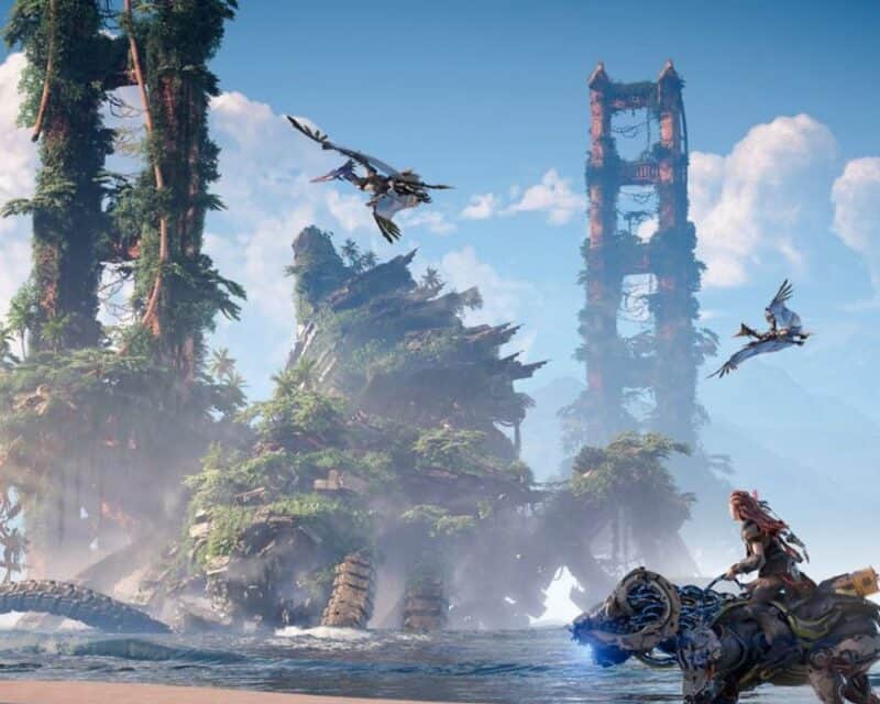 Horizon Forbidden West krajobrazy USA, na zdjęciu porośnięty roślinnością most, a raczej jego ruiny