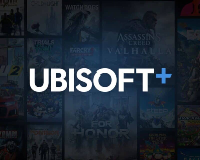 Biały napis Ubisoft z niebieskim plusem na końcu, na przyciemnianym tle złożonym z okładek znanych gier od Ubisoftu, Sony Ubisoft współpraca