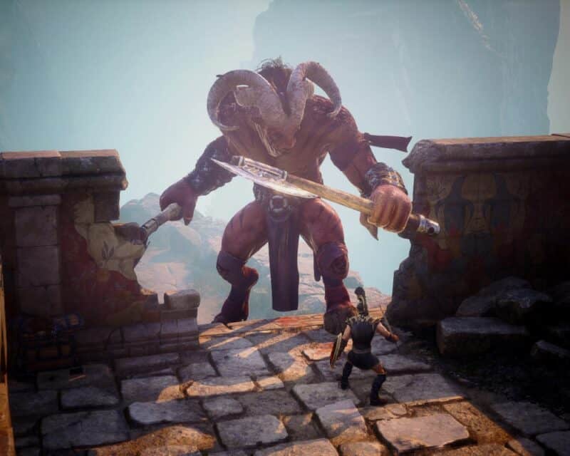 Achilles: Legends Untold: wojownik z grecką tarczą i hełmem greckiego żołnierza walczący z wielkim stworem z baranimi rogami na głowie i tatuażami bojowymi na ciele, stoi w dziurze w murze, Achilles Legends Untold premiera