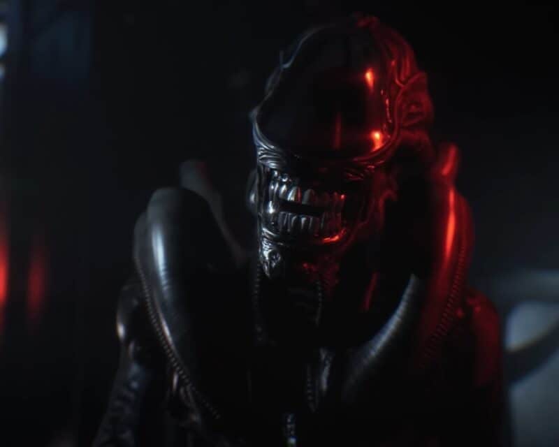 Aliens: Dark Descent: grafika przedstawiająca głowę i tułów czarnego potwora bez oczu, z długimi zębami, aliens: dark descent kiedy premiera