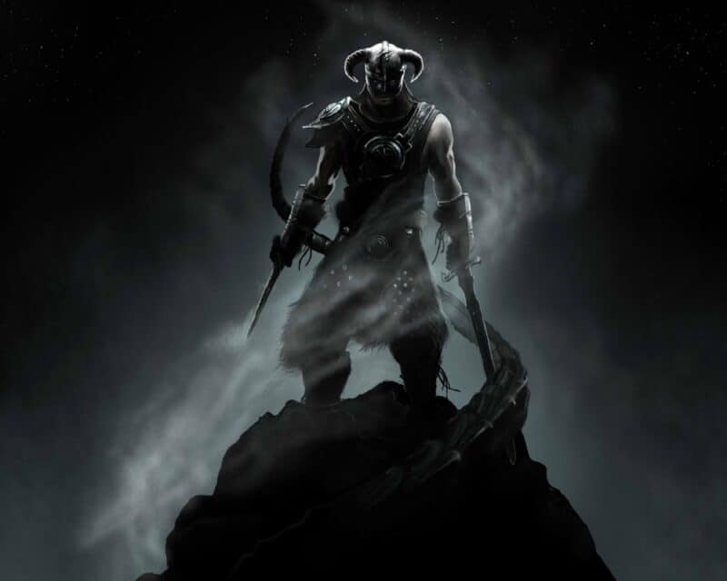 Znana jest data premiery Skyrim Together Reborn. Na zdjęciu znajduje się postać ze Skyrima, która stoi na górze i groźnie patrzy w kamerę.