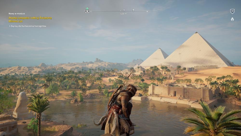 Asassin's Creed: Origins, Bayek na szczycie, w tle piramidy