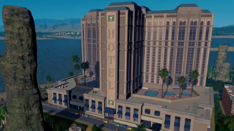 Obrazek przedstawia w pełni monumentalny hotel w śródziemnomorskim klimacie, jaki możemy zbudować dzięki dodatkowi