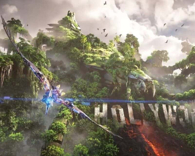 obrazek przedstawia górę, pod nią napis ,,Holywood" a w tle latająca maszyna