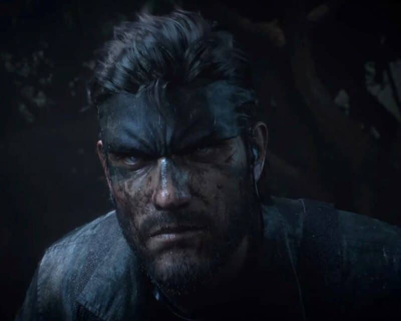 ubrudzony mężczyzna z czarną bandaną na czol