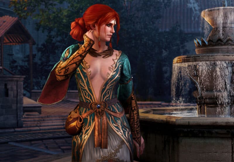 Grafika przedstawiająca strój z DLC do gry Wiedźmin: Dziki Gon dla Triss Merigold. Jest to zielona sukienka z dużym dekoltem.