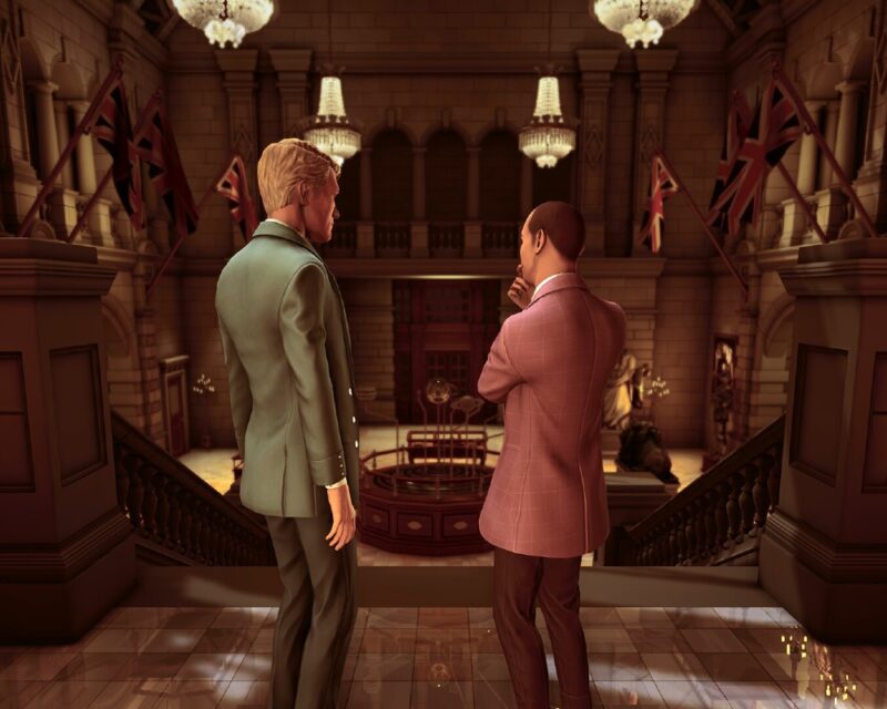 Hercule Poirot: The London Case - recenzja - zrzut ekranu z gry, Poirot i Hastings stoją na szczycie schodów w muzeum i patrzą w dół