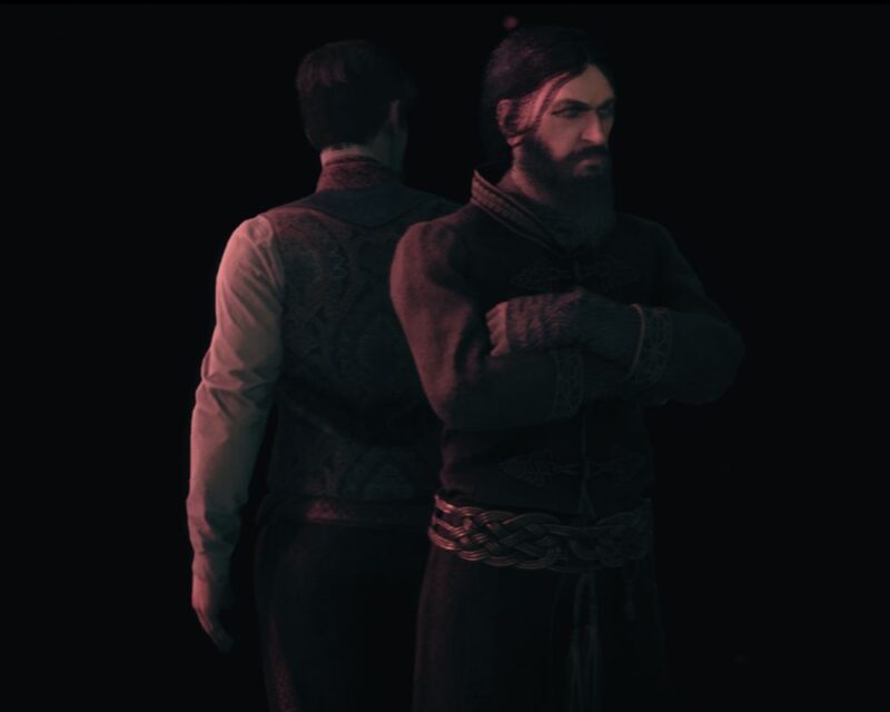 Dwóch mężczyzn stoi do siebie plecami