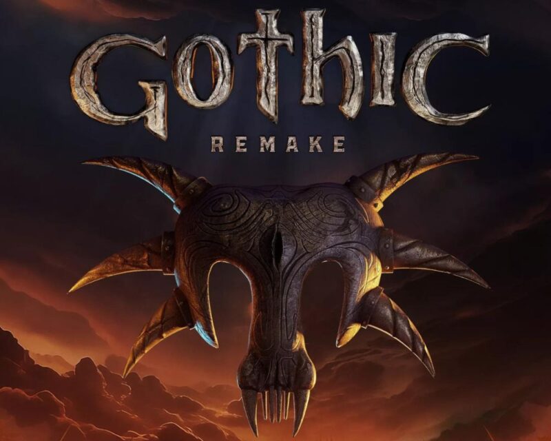 Napis Gothic Remake oraz maska Śniącego na ognistym tle