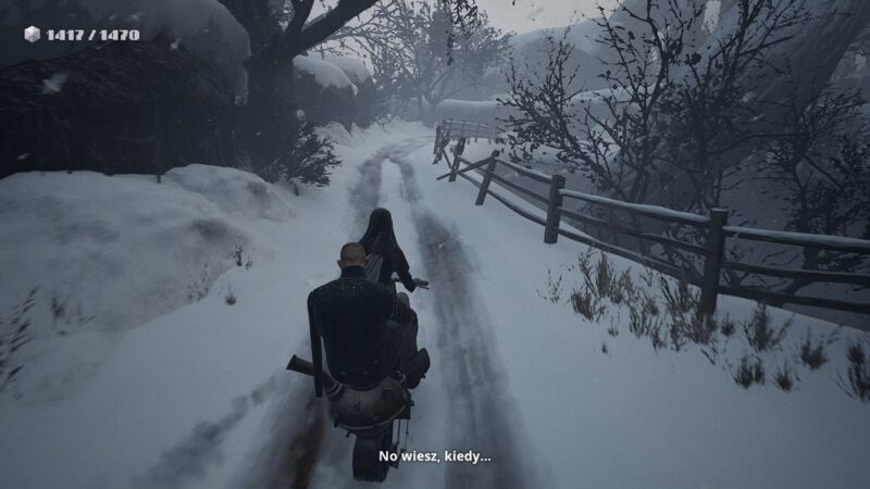 Indika i Ilja jadą na motorze przez zaśnieżoną okolicę