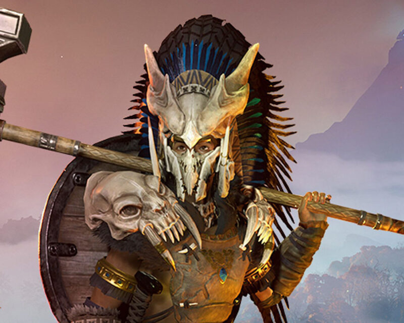 Grafika promująca grę Soulmask. Widzimy wojowniczkę zakrytą zbroją i hełmem. W dłoni trzyma młot.