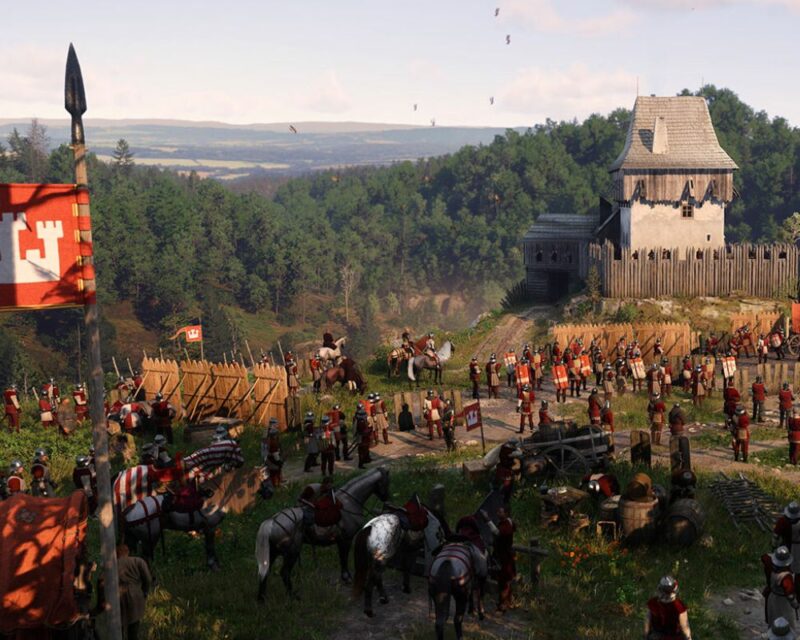 scena z gry Kingdom Come Deliverance 2, widać na niej rzut na pole przed osadą, pełne rycerzy szykujących się do bitwy
