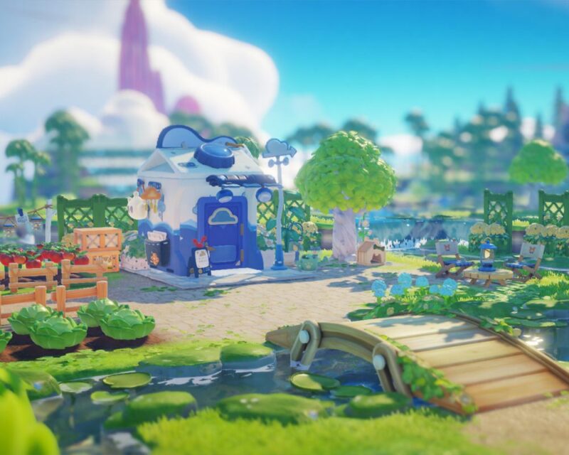 grafika z gry Floatopia (zapowiedź), widzimy na niej sielski obrazek z growego podwórka z domkiem, stylistyka jest bardzo bajkowa, kolory żywe i jasne, pastelowe, błękitne niebo z białymi chmurami, zielona trawa, w centrum domek z małym podwórkiem wokół