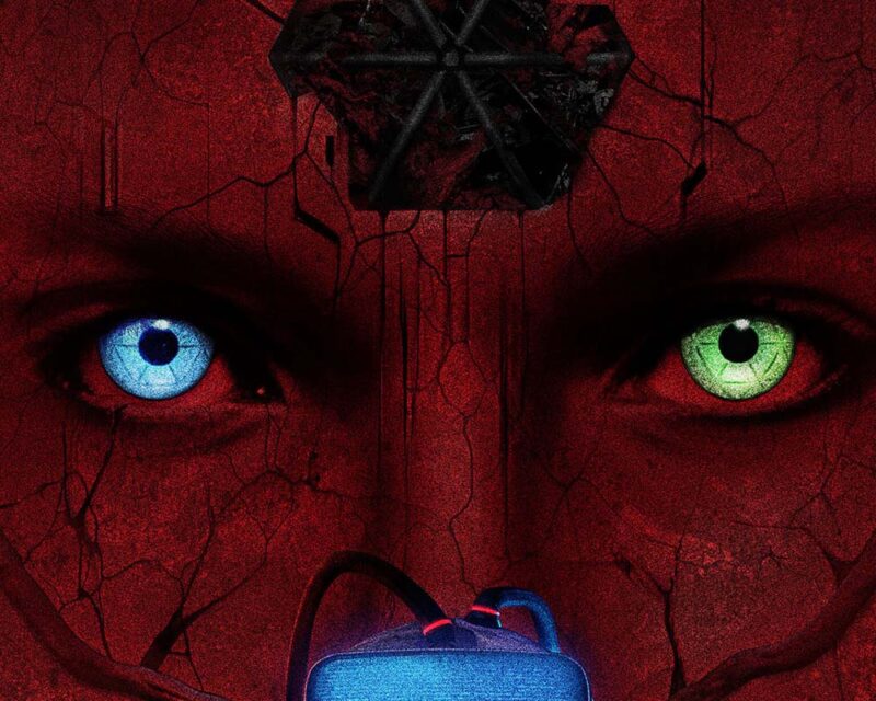 Zwiastun rozgrywki A.I.L.A. Ludzka twarz wtapiająca się w popękaną czerwoną ścianę. Na czole ma pęknięcie odsłaniające mechanizmy ze środka głowy. Postać posiada heterochromię – niebieskie i zielone oko.