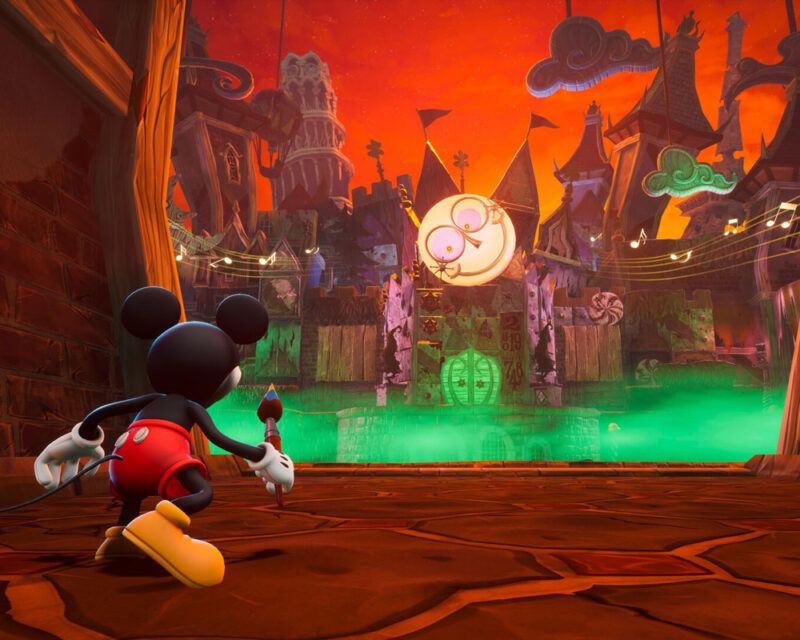 Zrzut ekranu z gry Disney Epic Mickey: Rebrushed. Uzbrojona w magiczny pędzel Myszka Mickey przemierza krainę zwaną Pustkowiami.