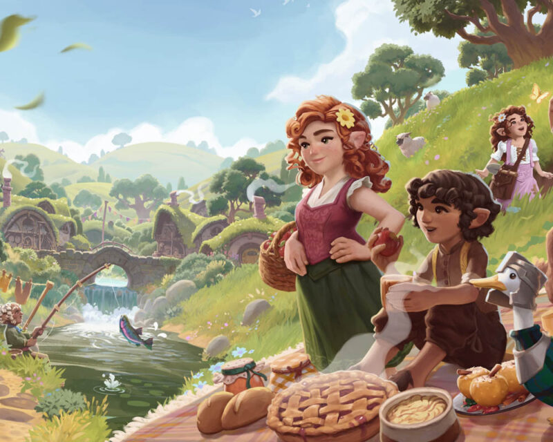 Grafika promująca grę Tales of the Shire. Sielankowy krajobraz hobbickiego miasteczka otoczonego wzgórzami i rzeką. Widzimy spacerujące, łowiące ryby i piknikujące hobbity.