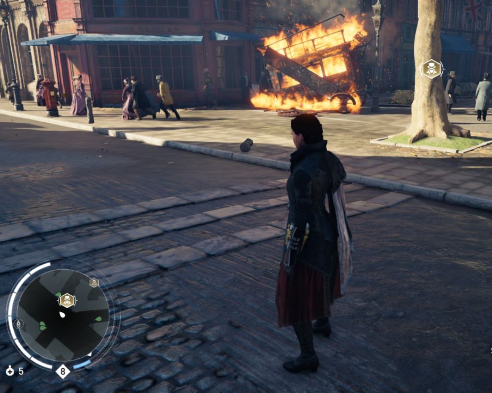 Zabójczyni stoi na drodze, na środku miasta, nieopodal płonie wóz