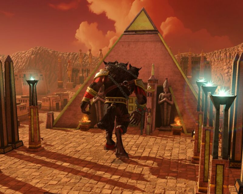 Obrazek przedstawia trójgłowego olbrzyma, jest do nas tyłem, przed nim widać piramidę