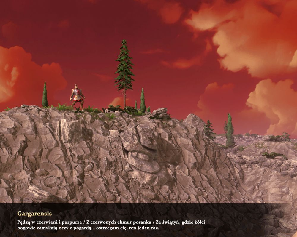 Na obrazku widać wrogiego wojownika, który stoi na jakiejś górze, spogląda na nas i grozi nam. Kolor nieba w tle jest czerwony.