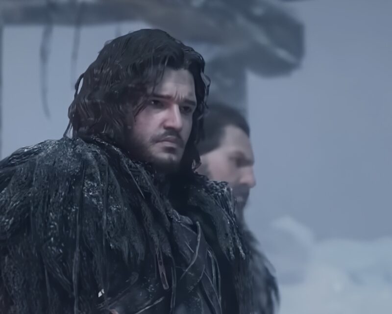 Na obrazku znajduje się Jon Snow z gry Game of Thrones: Kingsroad na tle mroźnego krajobrazu.