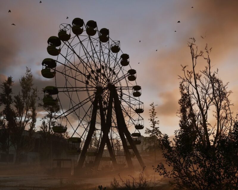 Na obrazku widać koło młyńskie na tle zony z gry STALKER 2.