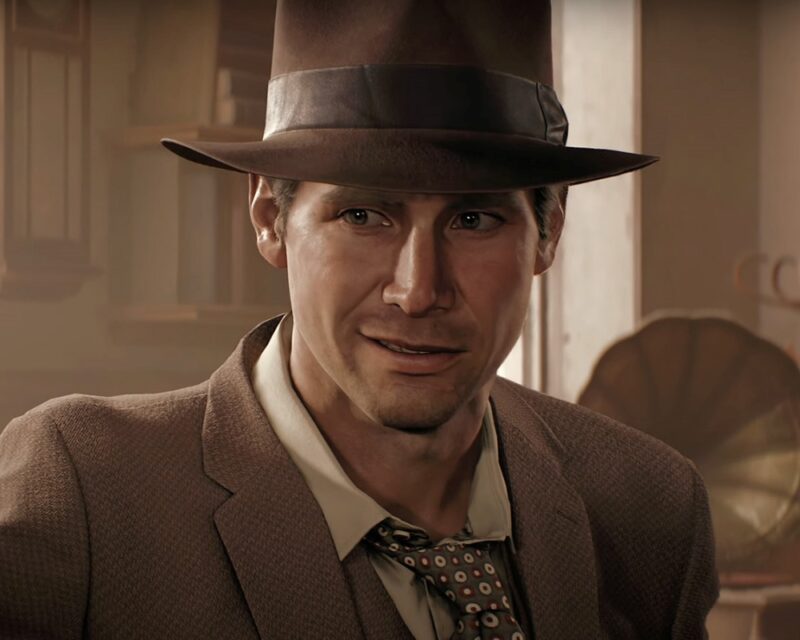 Grafika z gry Indiana Jones i Wielki Krąg przedstawiająca mężczyznę w kapeluszu i garniturze