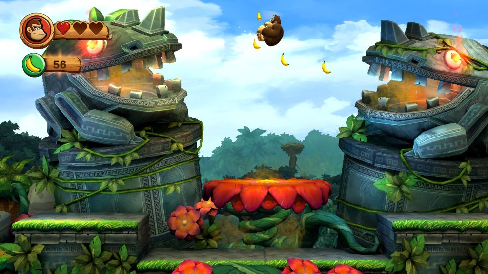 Screen z gry Donkey Kong Country Returns HD – widzimy na nim postać Donkey Konga odbijającego się od gigantycznego czerwonego kwiatu i zbierającego banany w powietrzu.