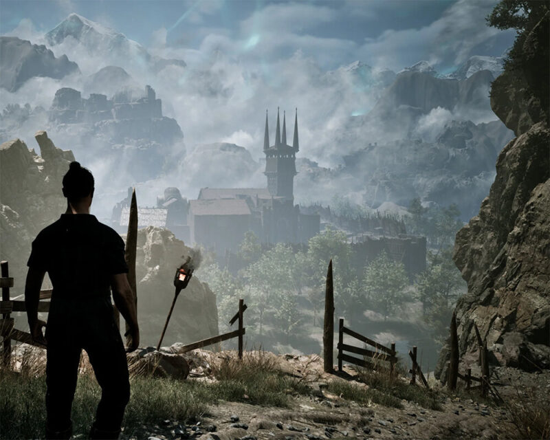 Postać obserwująca Górniczą Dolinę oświetloną promieniami zachodzącego słońca, otoczoną zielonymi wzgórzami i malowniczą rzeką płynącą przez jej środek.