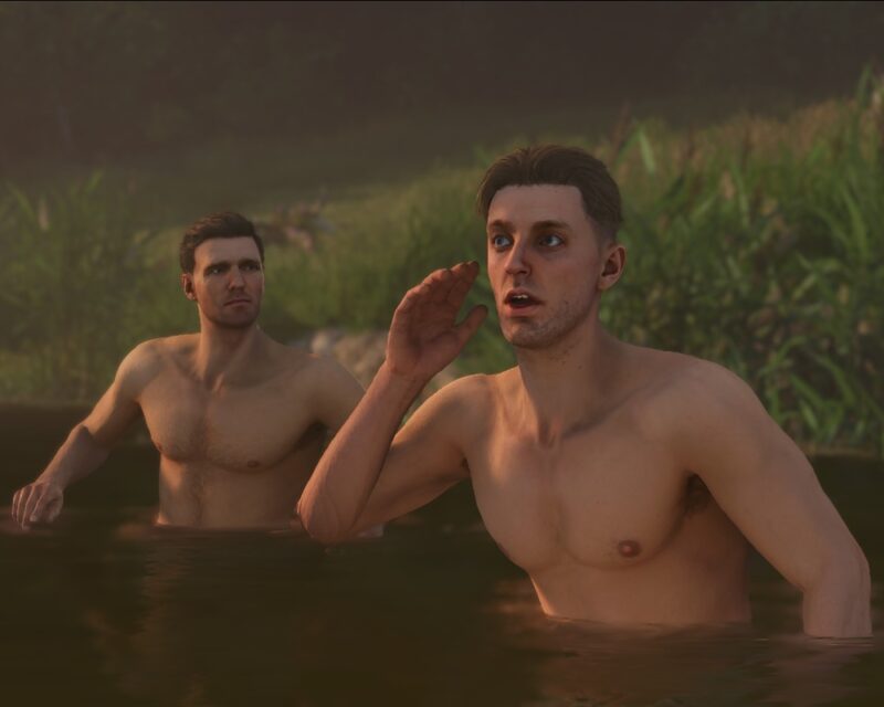 Dwóch mężczyzn kąpie się w jeziorze, jeden nastawia ucha.