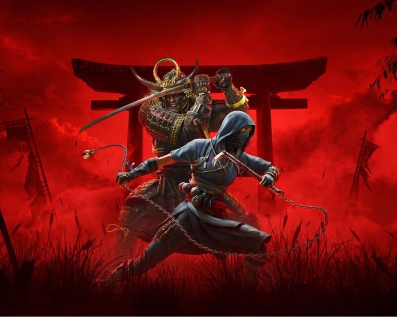 Obrazek przedstawia samuraja w złotej masce i ciężkiej zbroi oraz zamaskowanego ninja w niebieskim stroju. Samuraj trzyma miecz, a ninja ma broń na łańcuchu. Tło jest czerwone, z bramą i unoszącym się dymem.