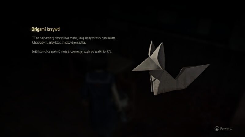 Lis z origami na czarnym tle z podpisem "Origami krzywd"