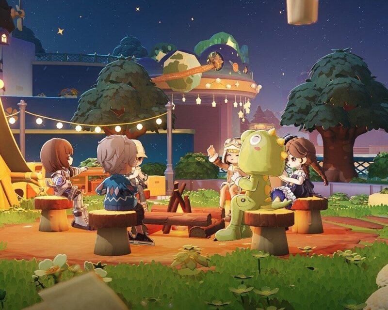 Petit Planet nowy zwiastun, postacie na jakimś wesołym, przyjaznym campingu, noc, niektóre postacie w piżamkach, wszyscy w koło przy ognisku