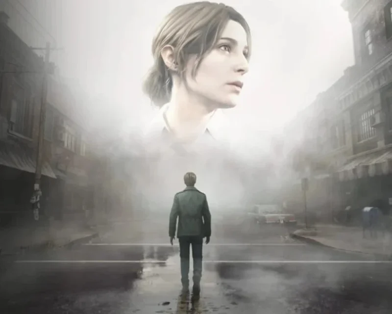 James Sunderland stoi we mgle na ulicy Silent Hill, z wizją Mary unoszącą się nad nim — premiera Silent Hill 2 remake Xbox