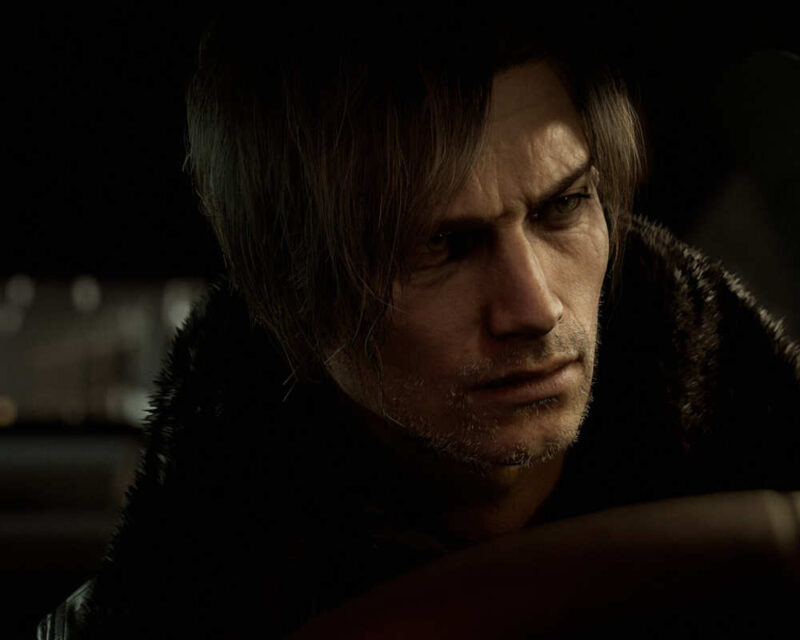 Na obrazku znajduje się mężczyzna, około 40 letni. Jest bardzo skupiony. Ma średniej długości, jasne włosy. Jest ledwo widoczny, ponieważ sceneria jest bardzo ciemna i dominują w niej odcienie czerni i szarości. Całość jest mroczna.