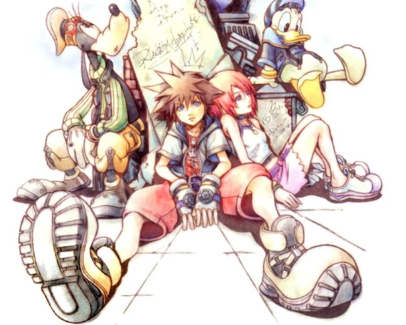 Grafika przedstawia chłopca z brązowymi, spiczastymi włosami. Ma biało-czerwone ubrania, duże żółte buty i białe rękawiczki. Za nim znajduje się kamień z rysunkiem korony. Obok niego siedzi dziewczynka z krótkimi, czerwonymi włosami. Ma na sobie biały top i różową spódnicę. W tle widzimy postac białej kaczki w niebieskich ubraniach i psa w żółto-zielonych ubraniach. Całość ma jasne, delikatne kolory.