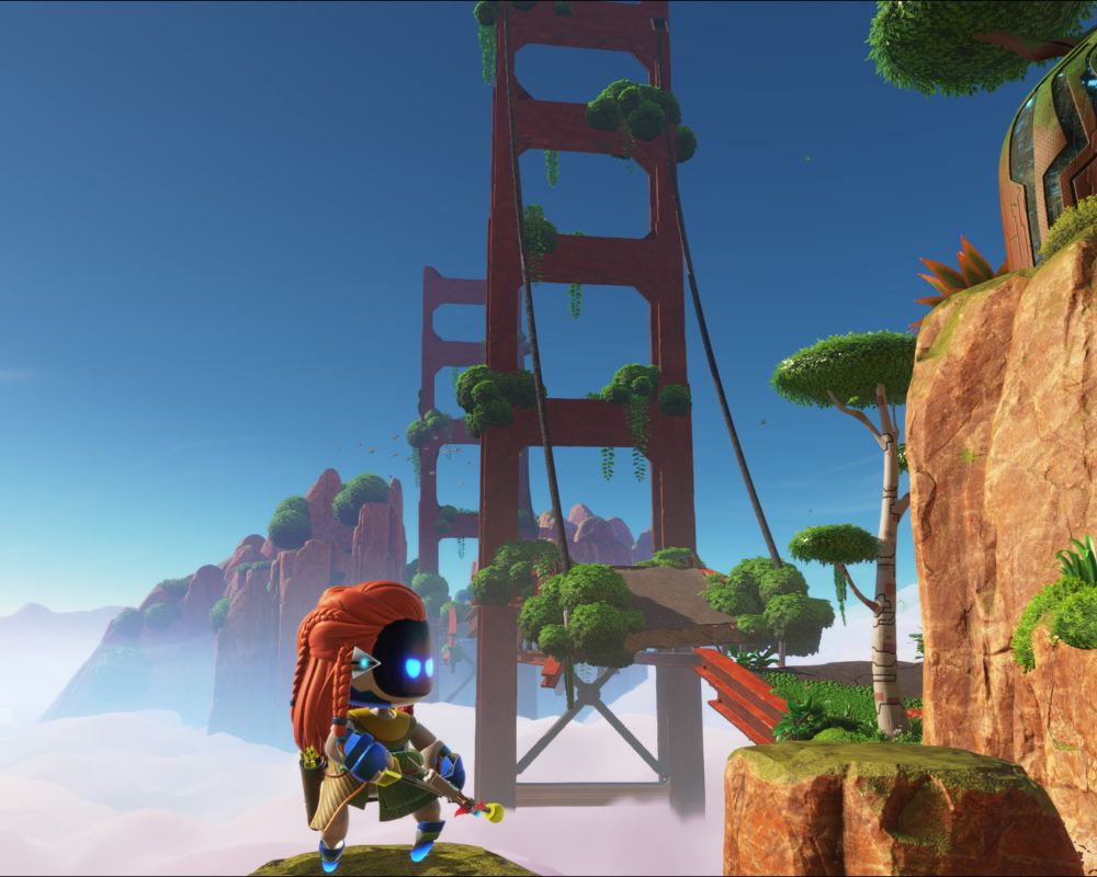 Scena z gry Astro Bot pokazująca małego robota z łukiem stojącego na klifie, z futurystyczną wersją mostu w tle.