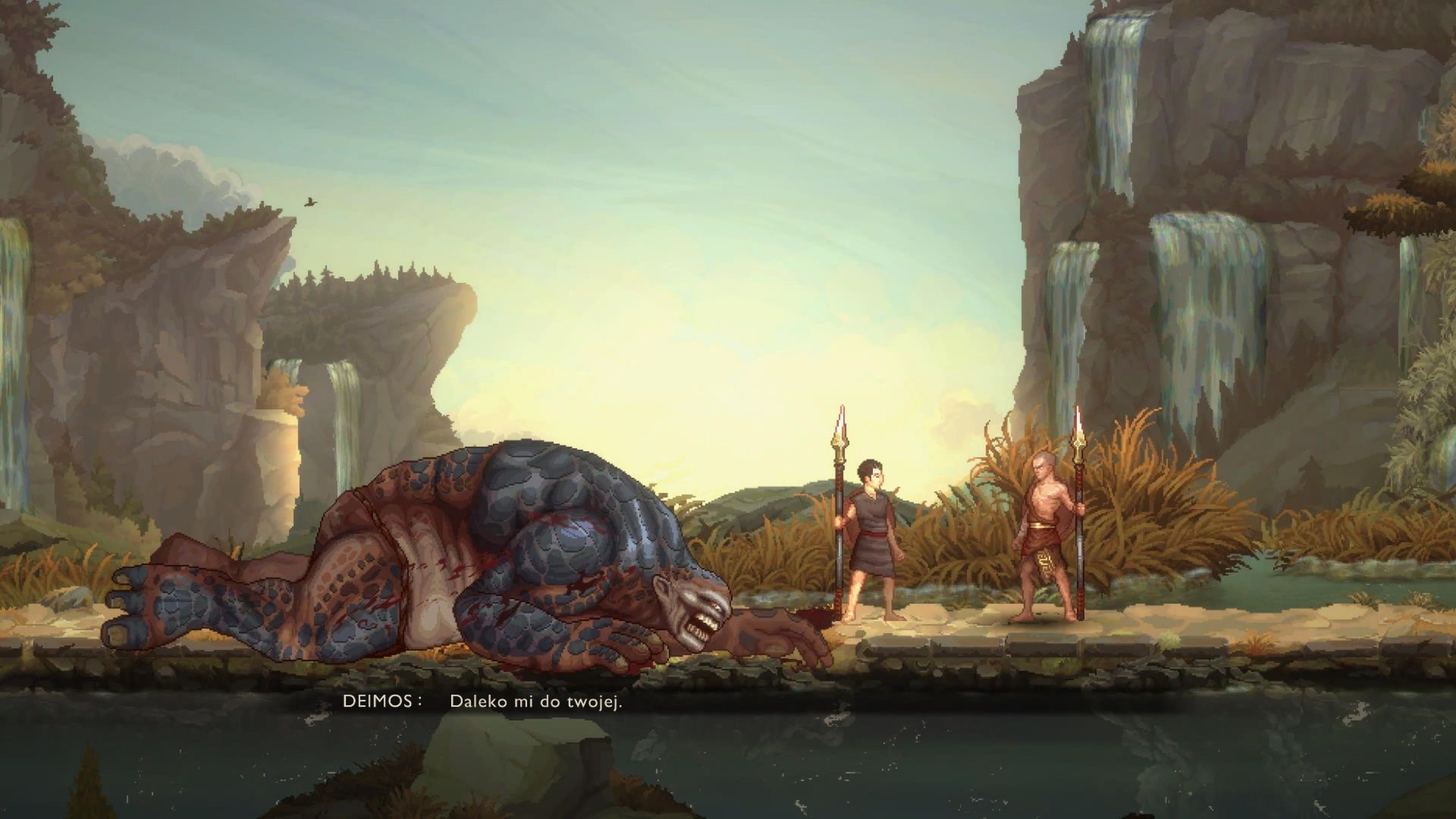 Scena z God of War Sons of Sparta, w której młody Kratos i Deimos stoją z włóczniami obok pokonanego potwora nad rzeką, na tle skalistych klifów i wodospadów, z widocznym dialogiem na ekranie: "DEIMOS: Daleko mi do twojej".